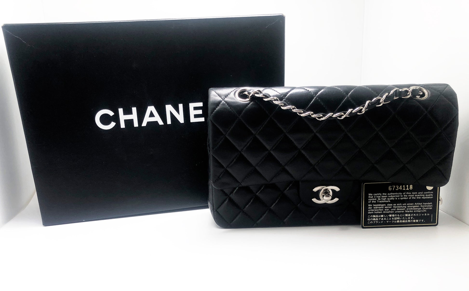 Sac Chanel Timeless médium 25 cm à double rabat en cuir d'agneau matelassé noir - Soline