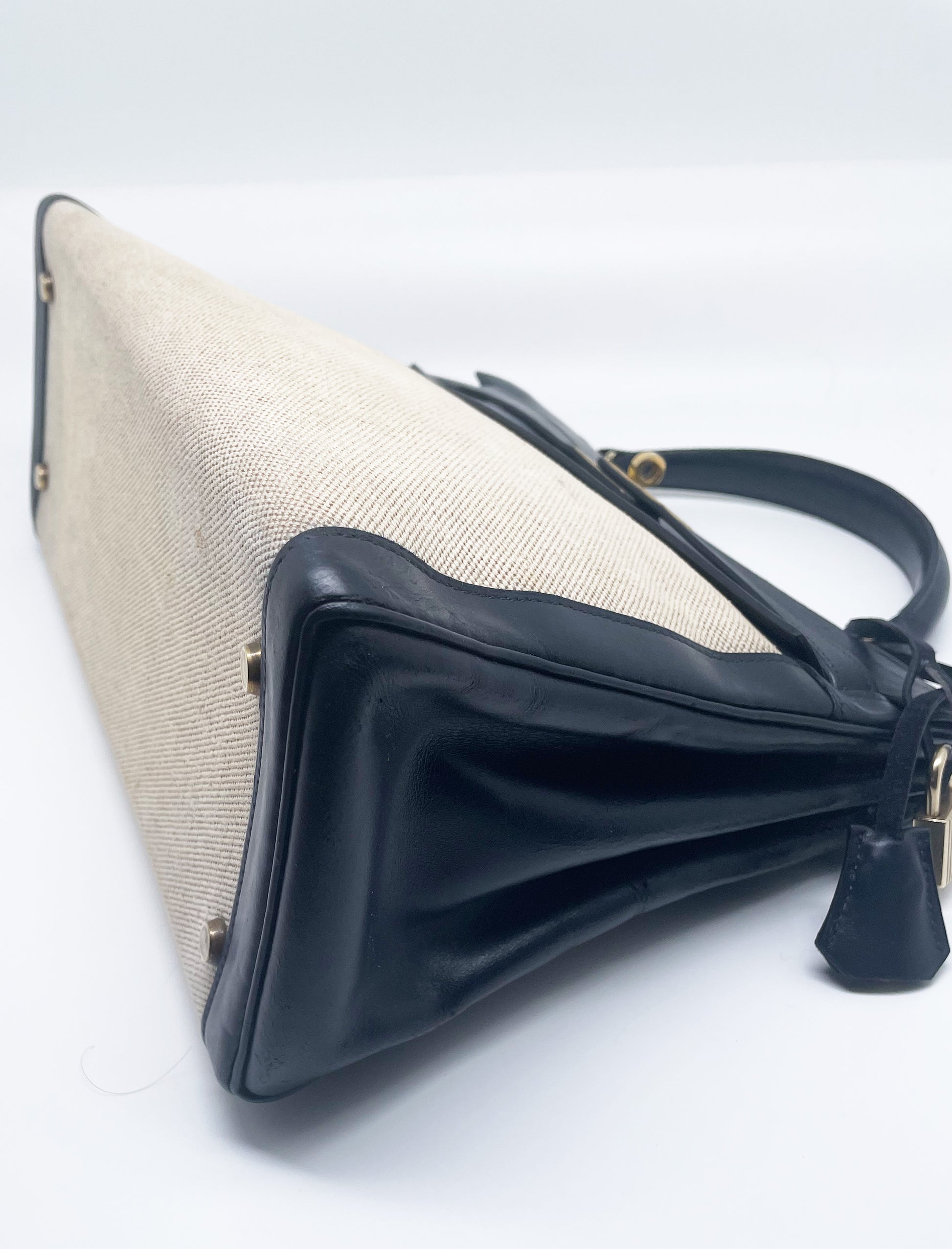 sac à main Hermès Kelly 32 retourne bi-matière en box de cuir bleu marine et toile beige - Soline
