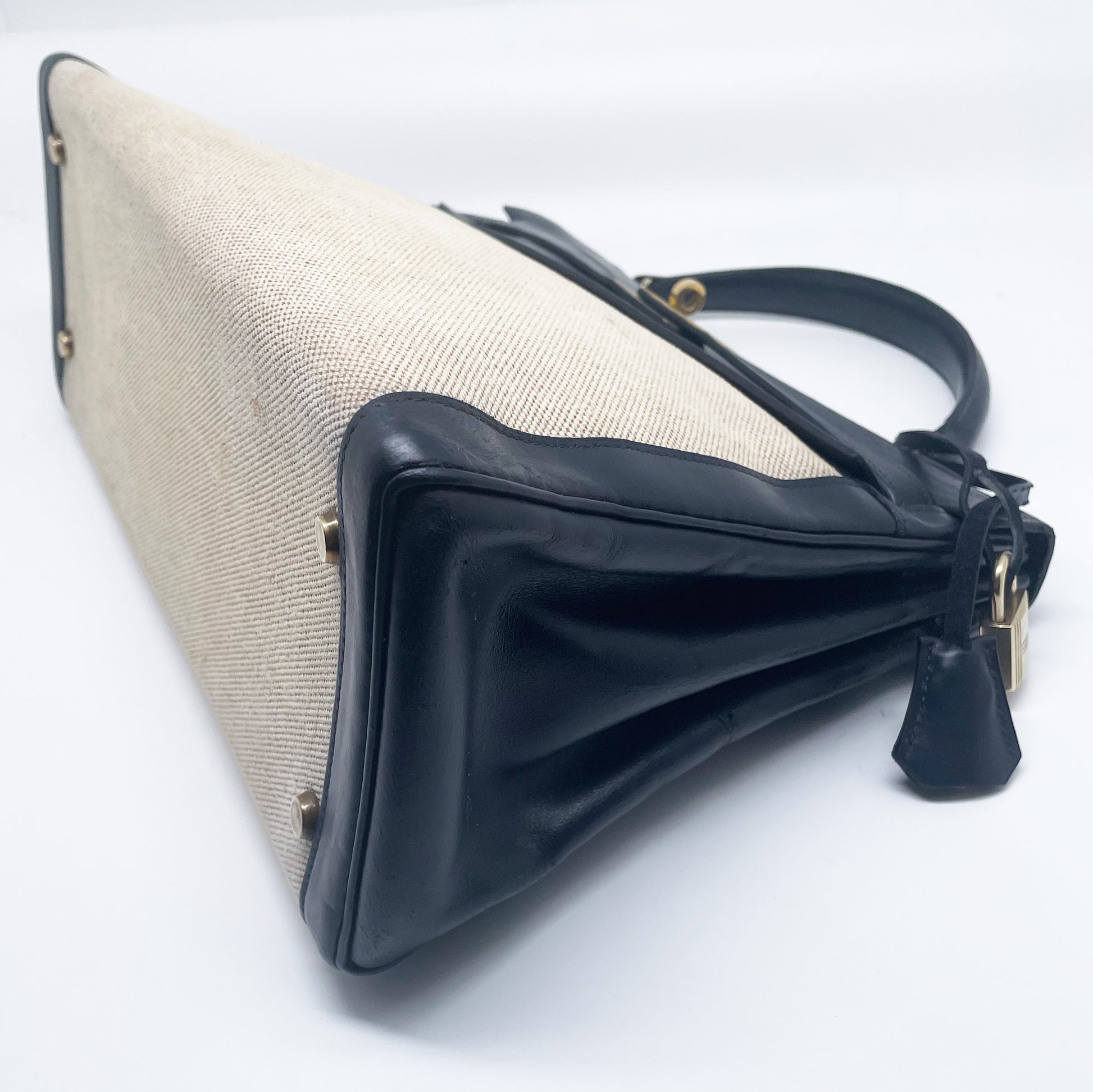 sac à main Hermès Kelly 32 retourne bi-matière en box de cuir bleu marine et toile beige - Soline
