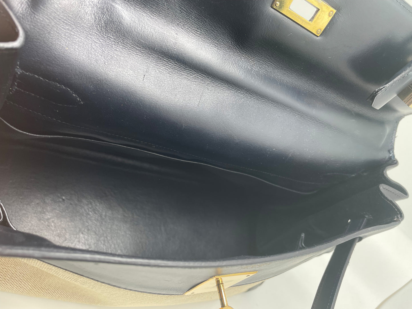sac à main Hermès Kelly 32 retourne bi-matière en box de cuir bleu marine et toile beige - Soline