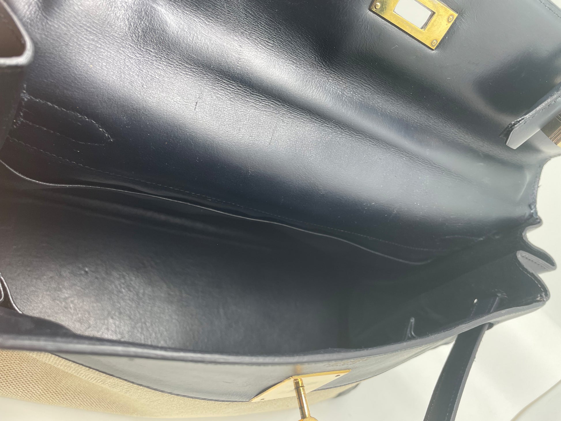 sac à main Hermès Kelly 32 retourne bi-matière en box de cuir bleu marine et toile beige - Soline