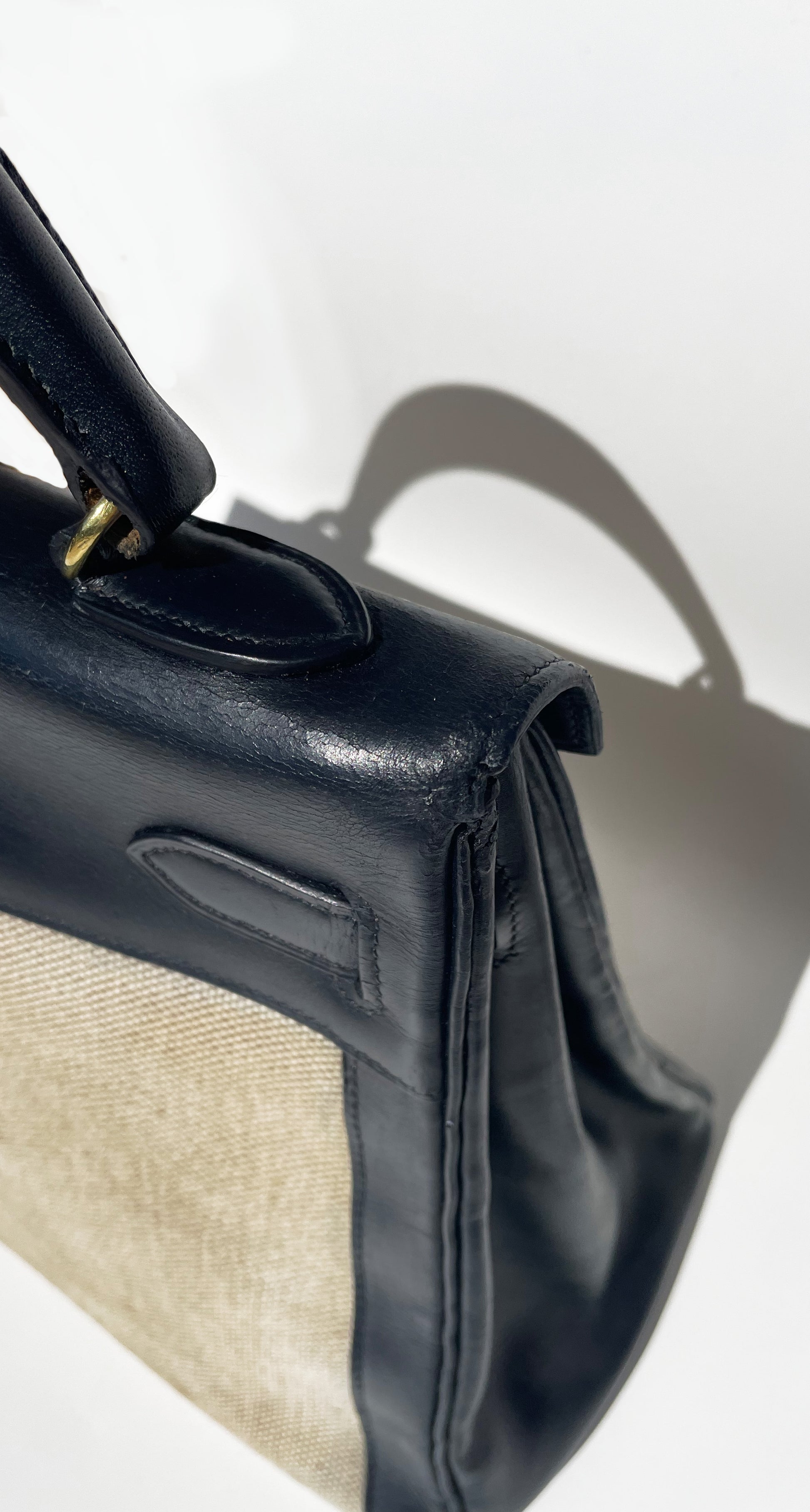 sac à main Hermès Kelly 32 retourne bi-matière en box de cuir bleu marine et toile beige - Soline