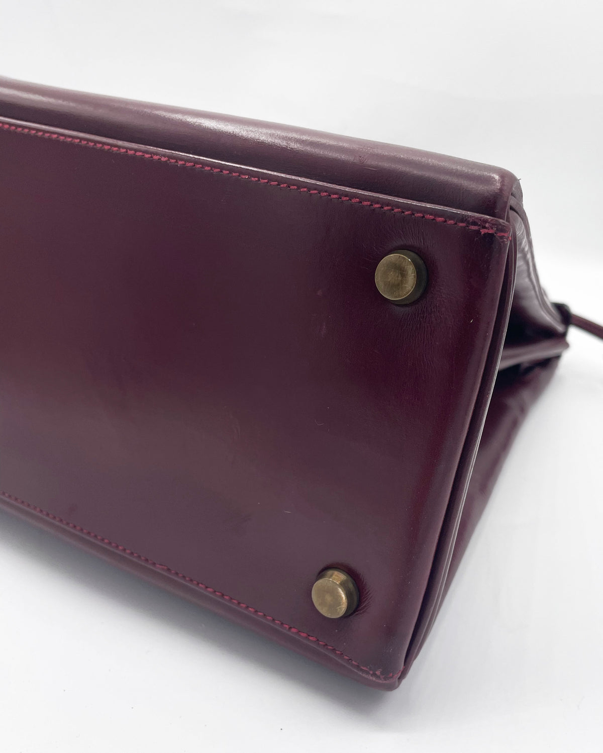 Sac Hermès Kelly 32 en cuir de box bordeaux