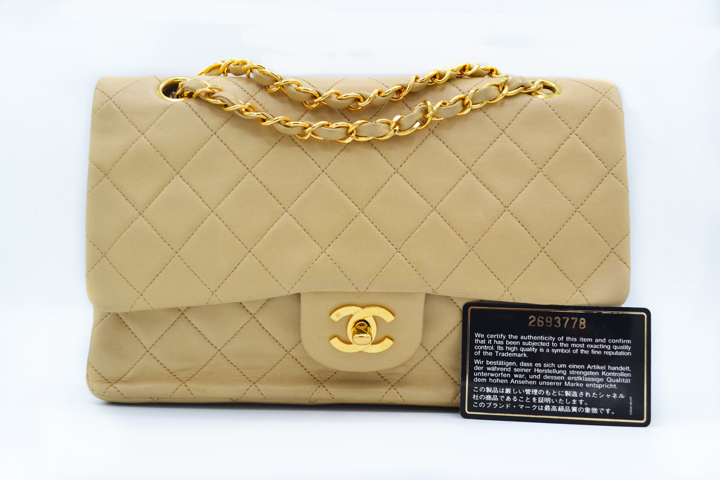 Sac Chanel Timeless medium 25 cm à double rabat en cuir d'agneau matelassé beige - Soline