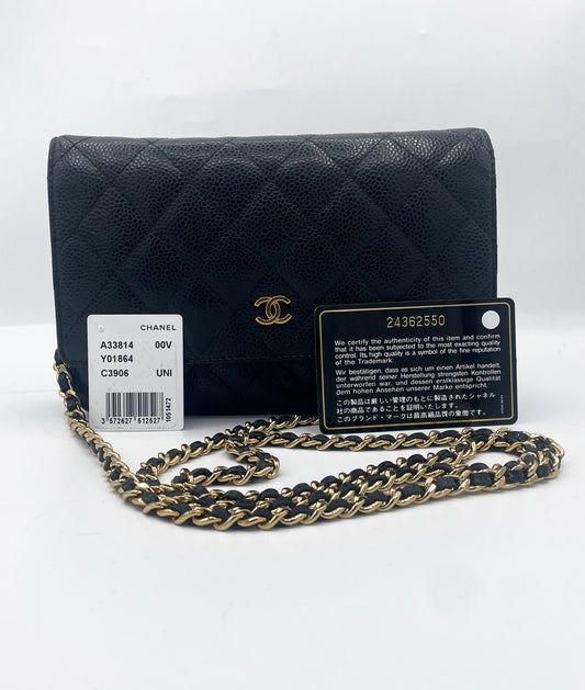  sac bandoulière Chanel Wallet on Chain en cuir grainé matelassé noir