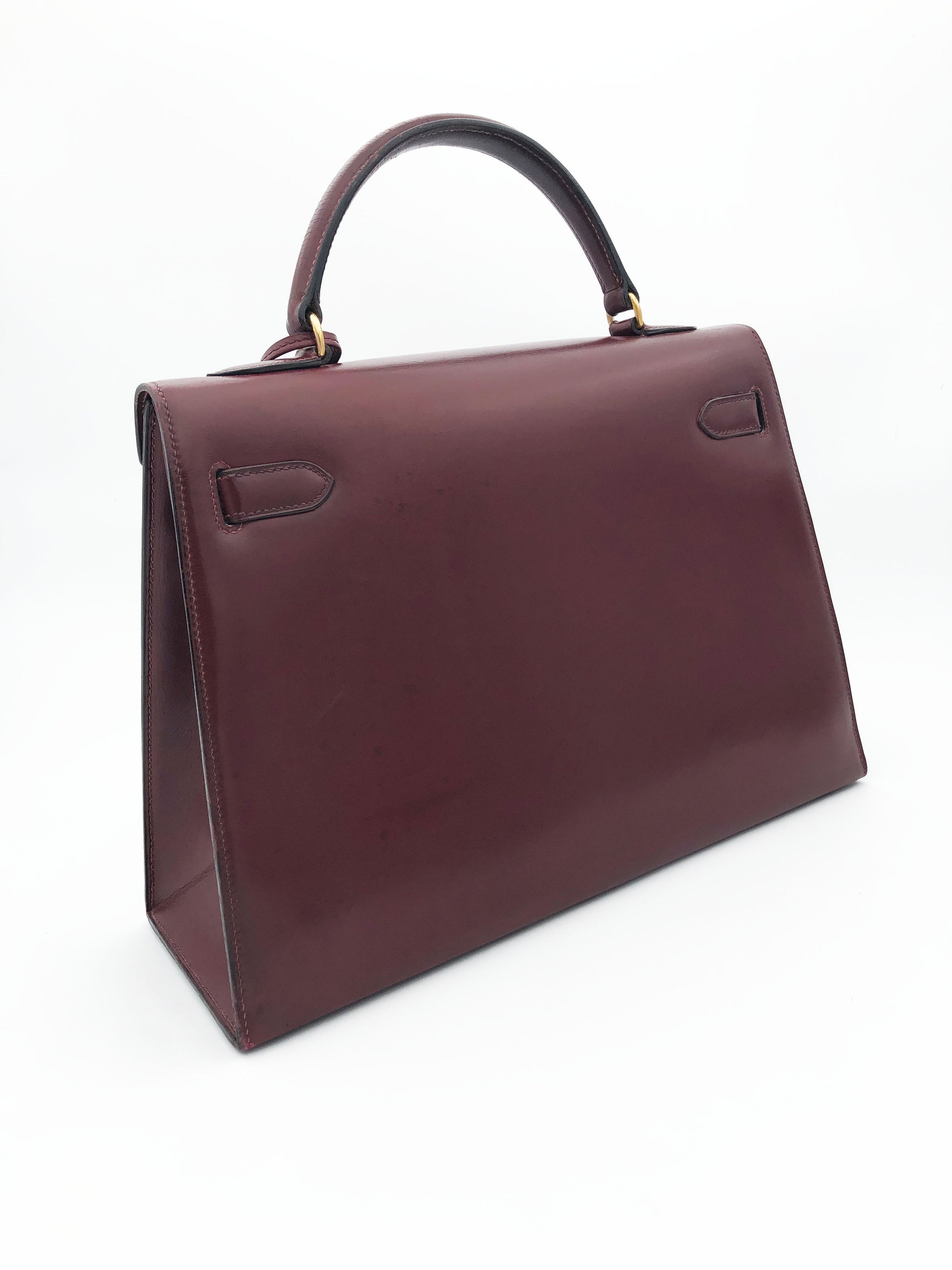 Hermès Sac Kelly 32 en cuir de box bordeaux sellier