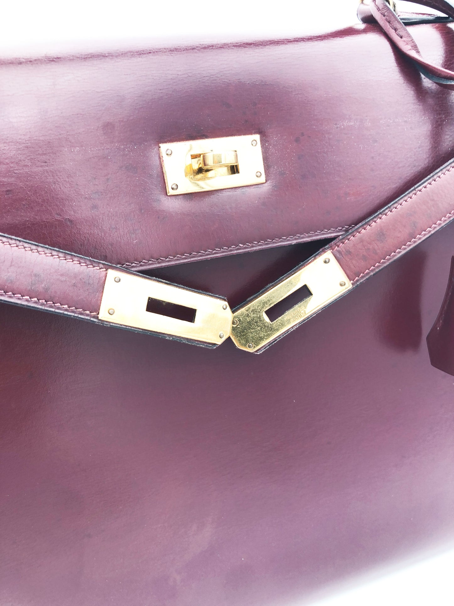 Hermès Sac Kelly 32 en cuir de box bordeaux sellier