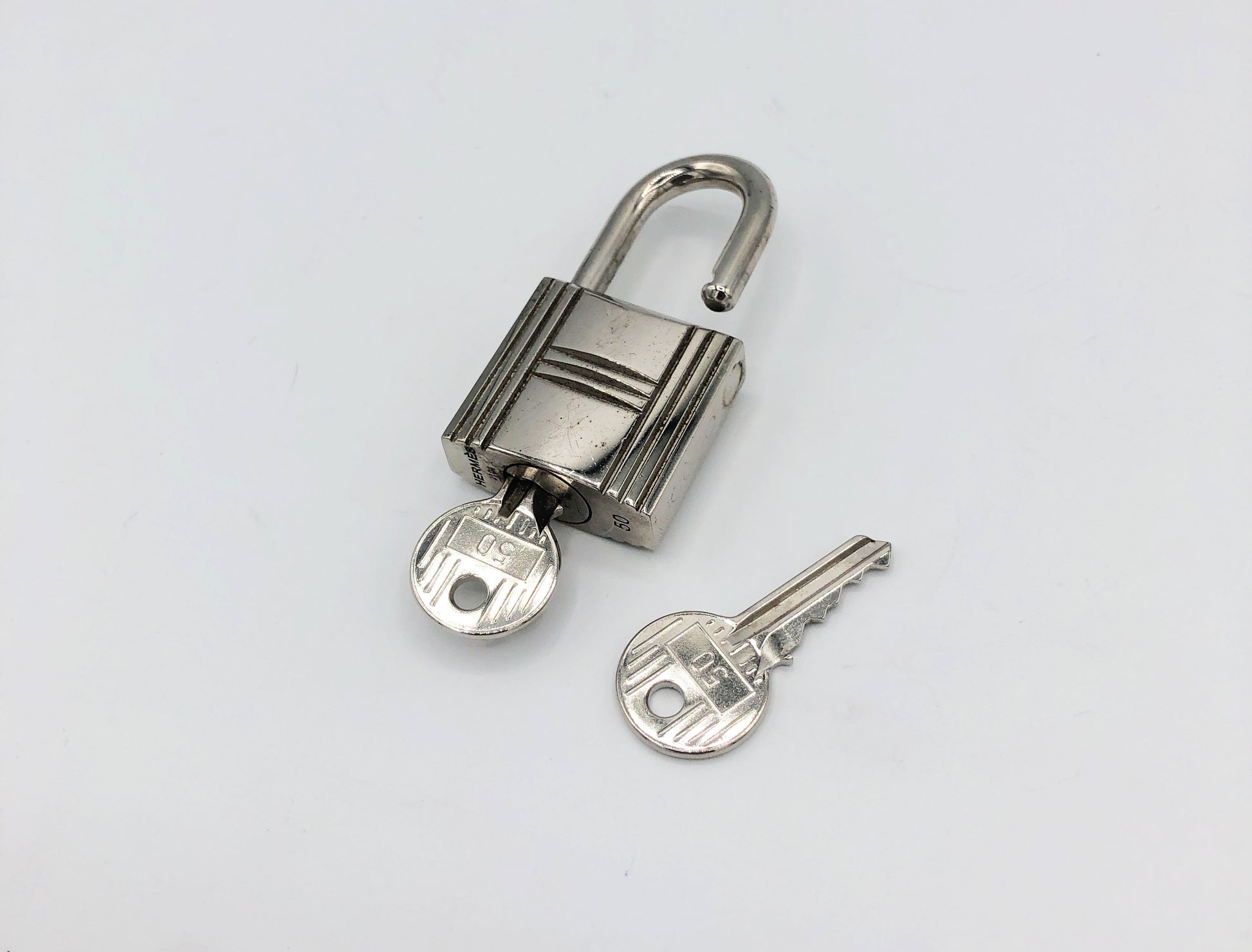 cadenas et clés hermes