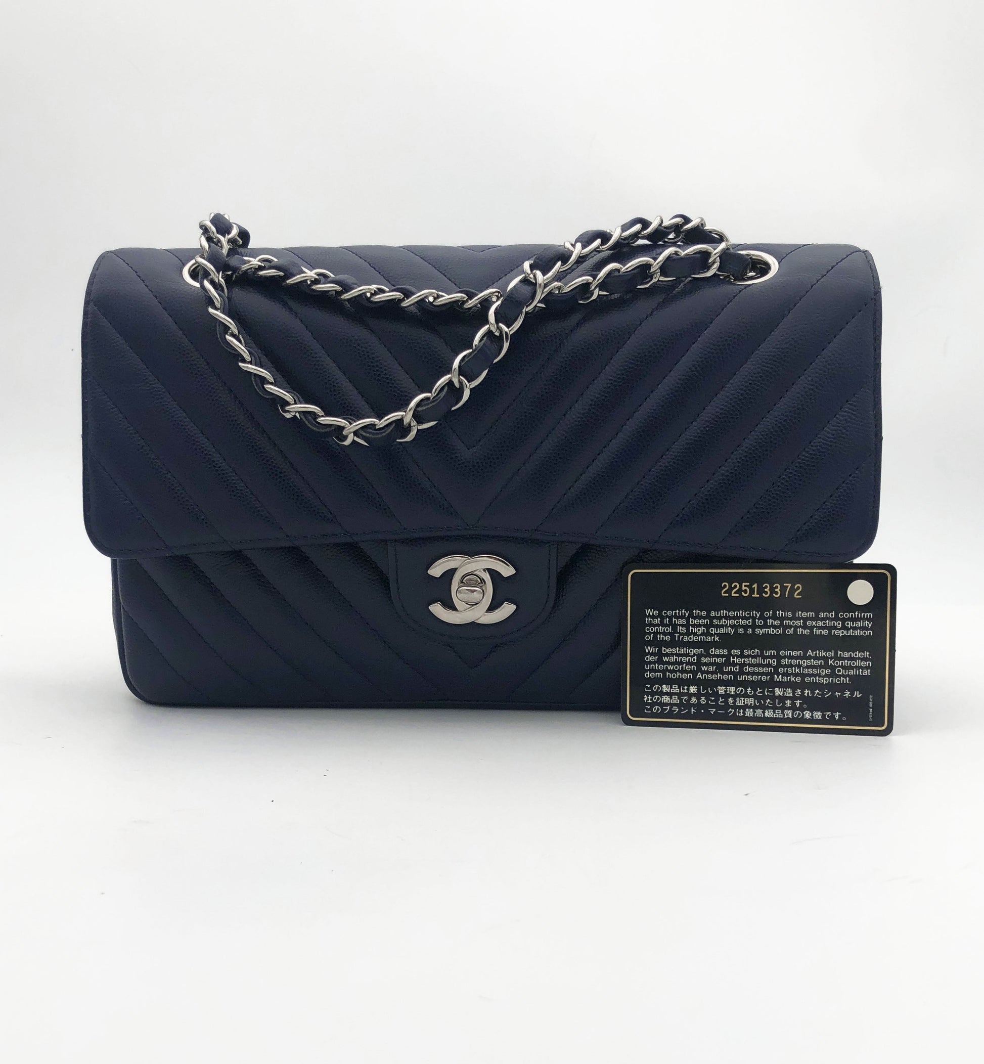 Chanel sac à main timeless / classique chevron cuir grainé bleu nuit. - Soline