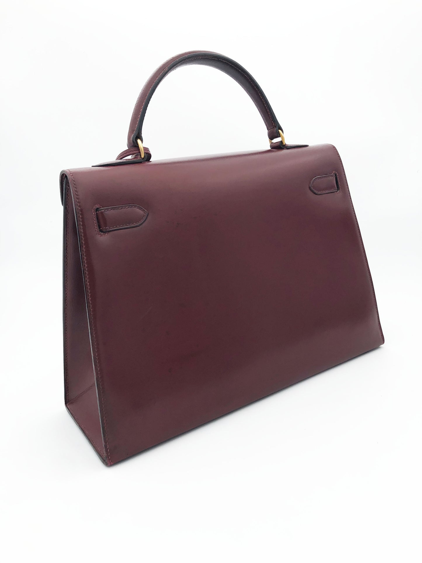 Hermès Sac Kelly 32 en cuir de box bordeaux sellier - Soline