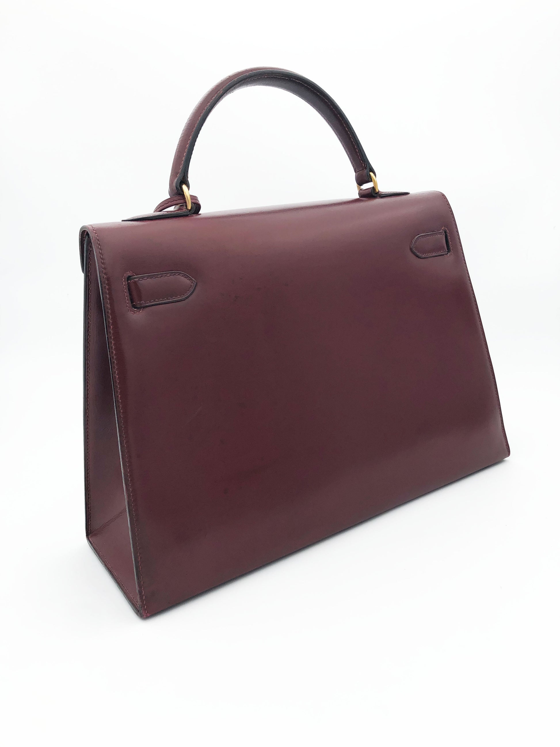 Hermès Sac Kelly 32 en cuir de box bordeaux sellier - Soline