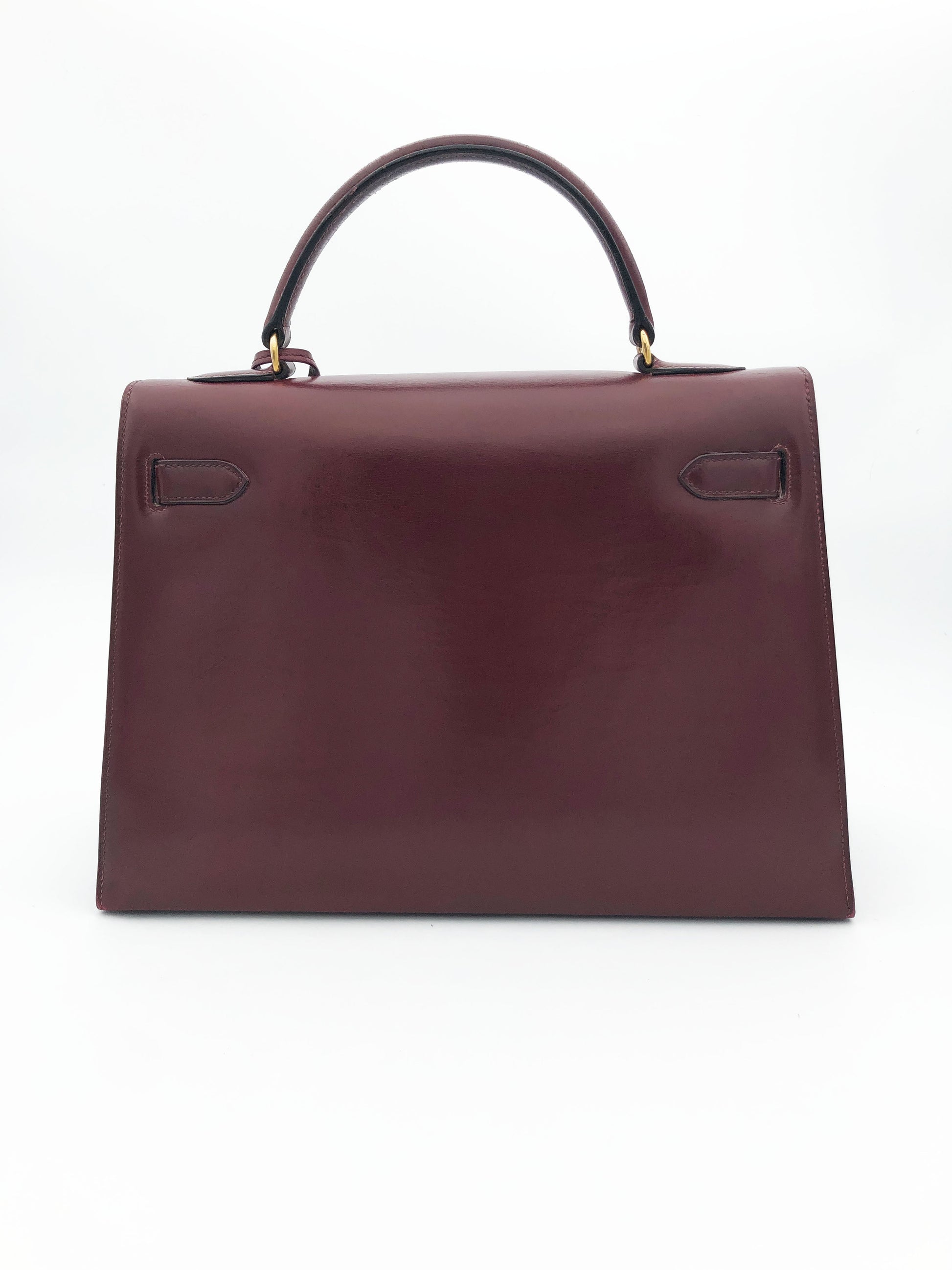 Hermès Sac Kelly 32 en cuir de box bordeaux sellier - Soline