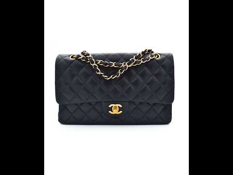 Sac Chanel timeless double rabat en cuir d'agneau noir et bijouterie dorée