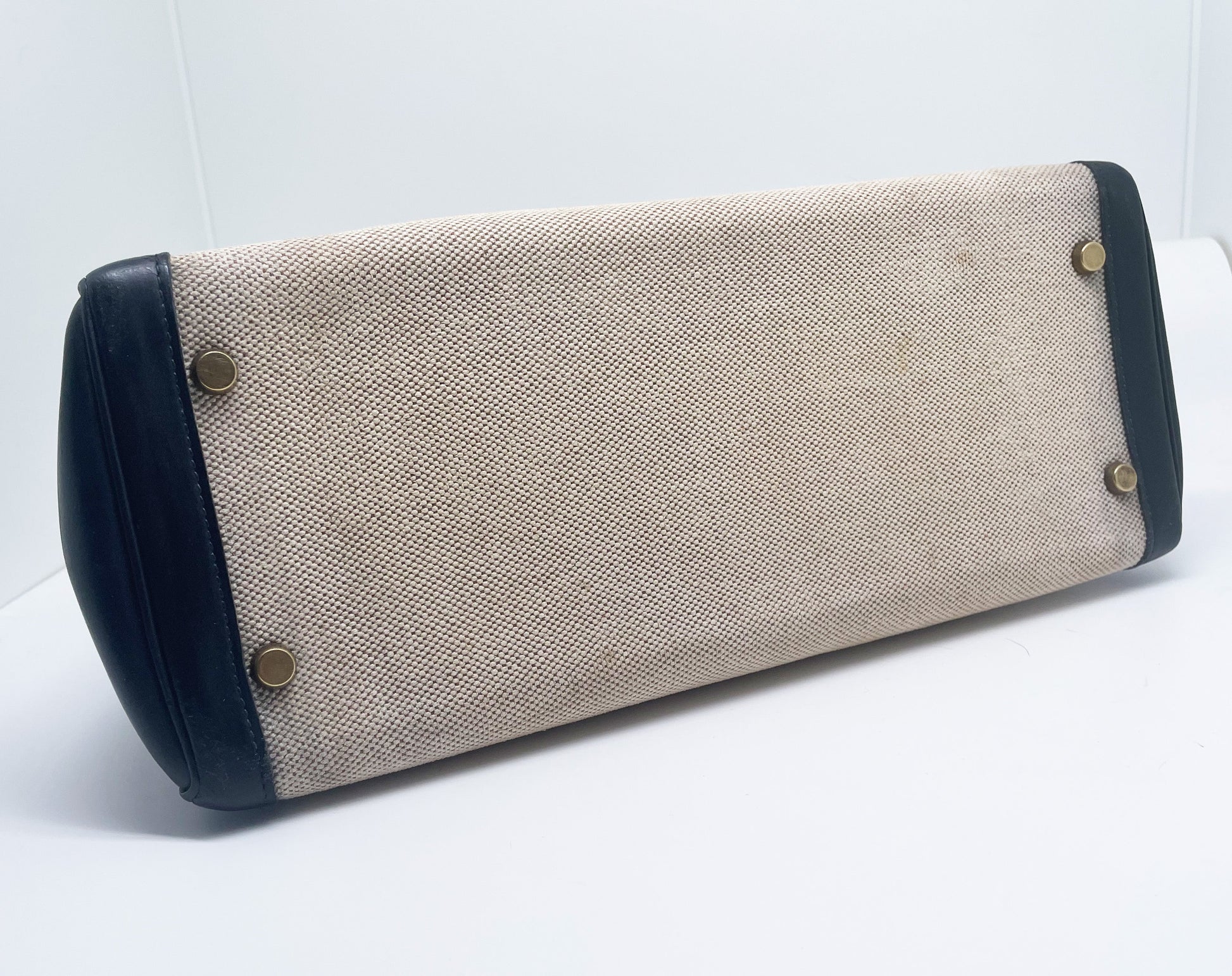 sac à main Hermès Kelly 32 retourne bi - matière en box de cuir bleu marine et toile beige - Soline