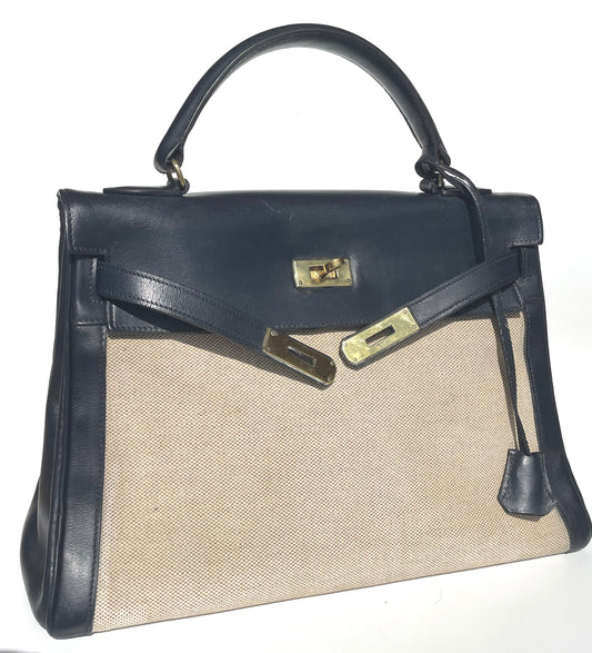sac à main Hermès Kelly 32 retourne bi - matière en box de cuir bleu marine et toile beige - Soline