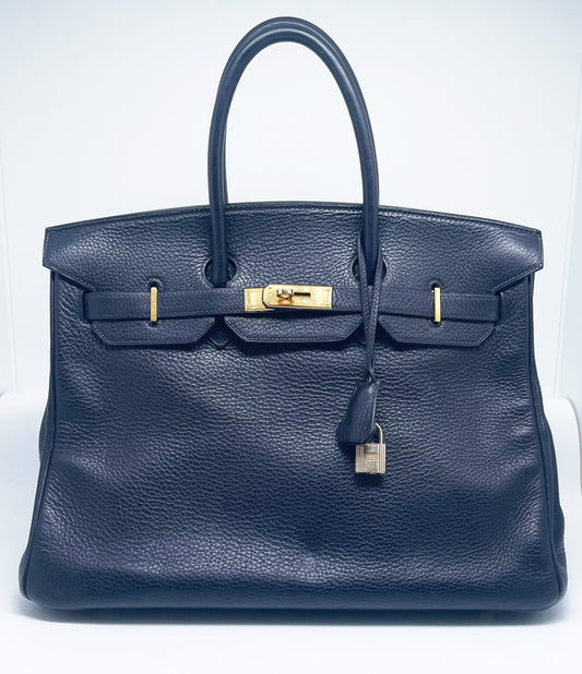 Sac Hermès Birkin en cuir Togo Bleu Nuit 35 cm, garniture en métal doré. - Soline