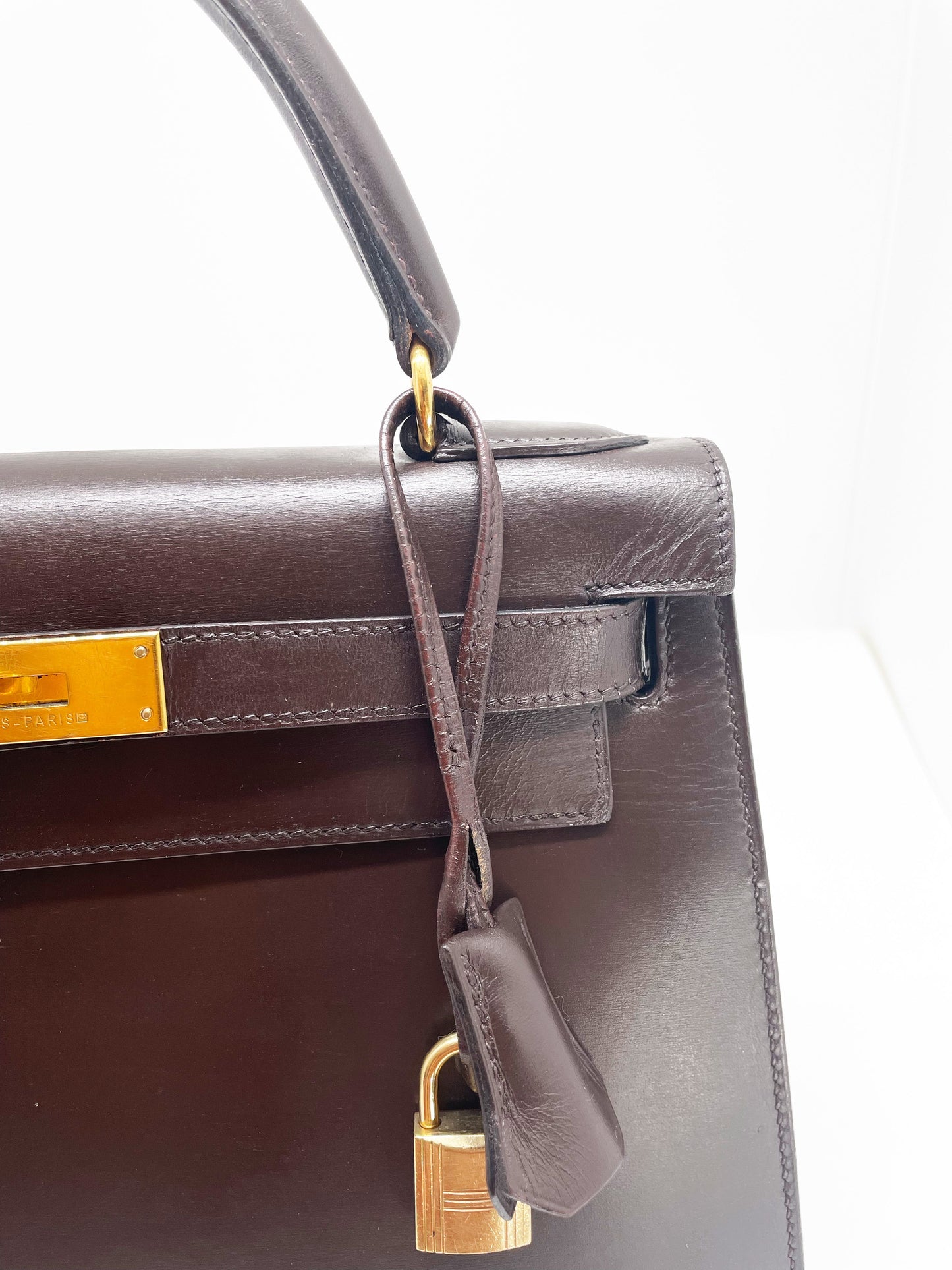 Sac Hermès Kelly 28 SELLIER chocolat en cuir box - Soline