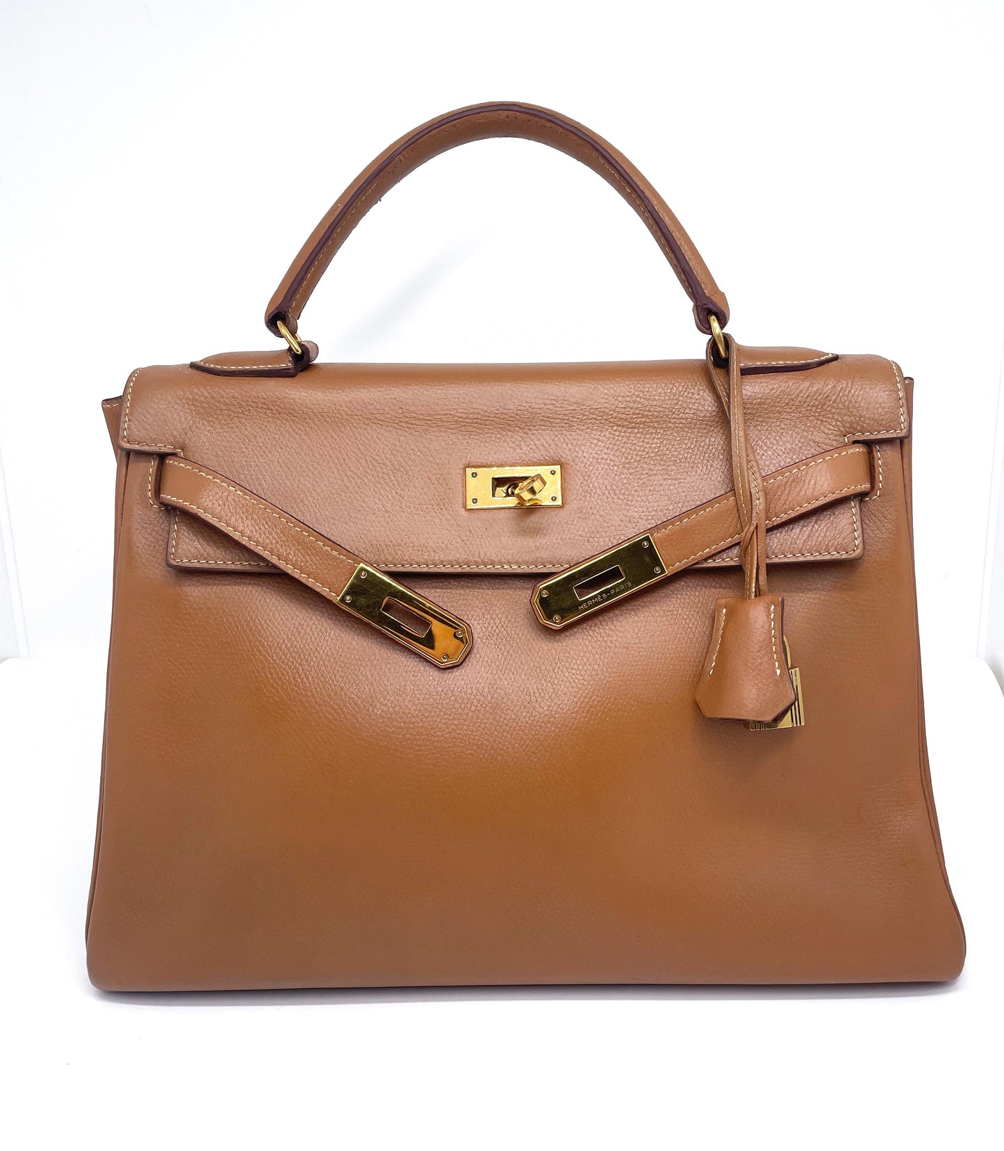 Sac Hermès Kelly 32 cm en cuir courchevel gold - Soline