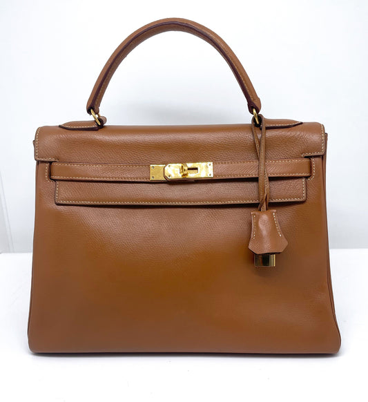 Sac Hermès Kelly 32 cm en cuir courchevel gold - Soline