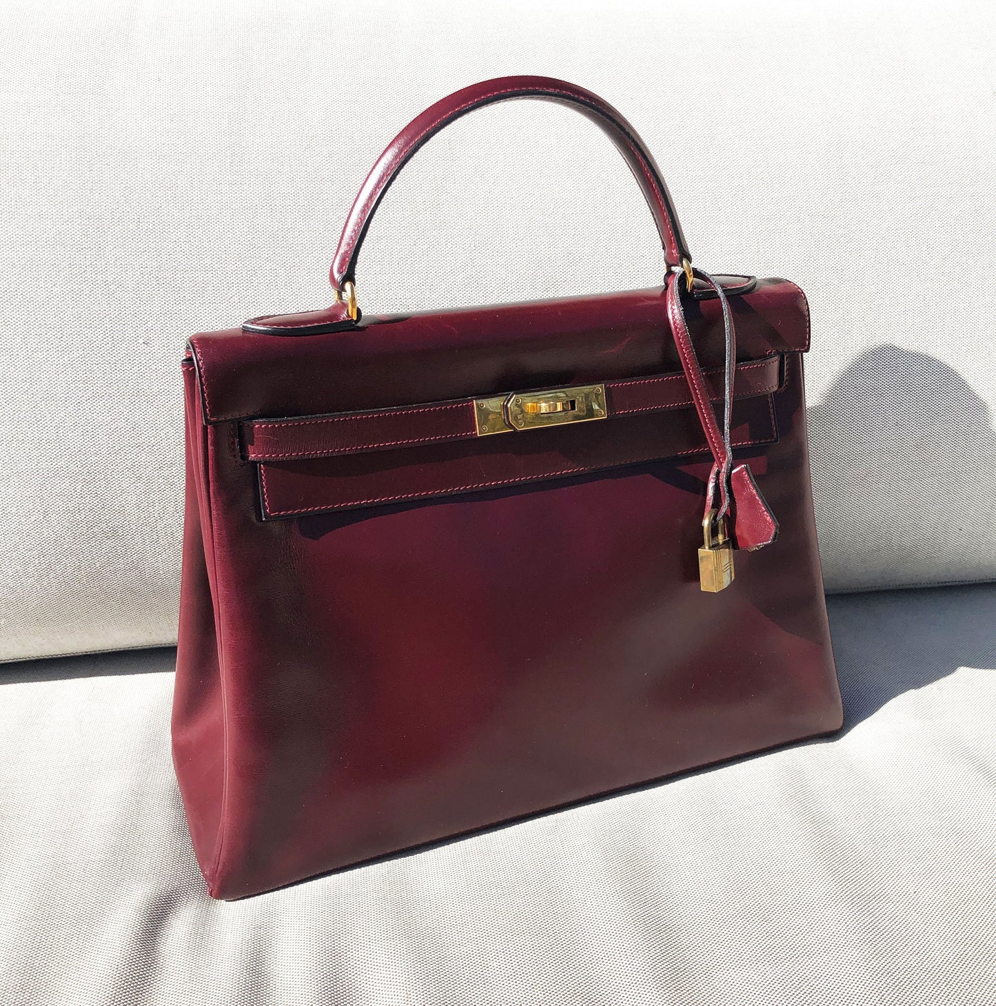 Sac Hermès Kelly 32 en cuir de box bordeaux - Soline
