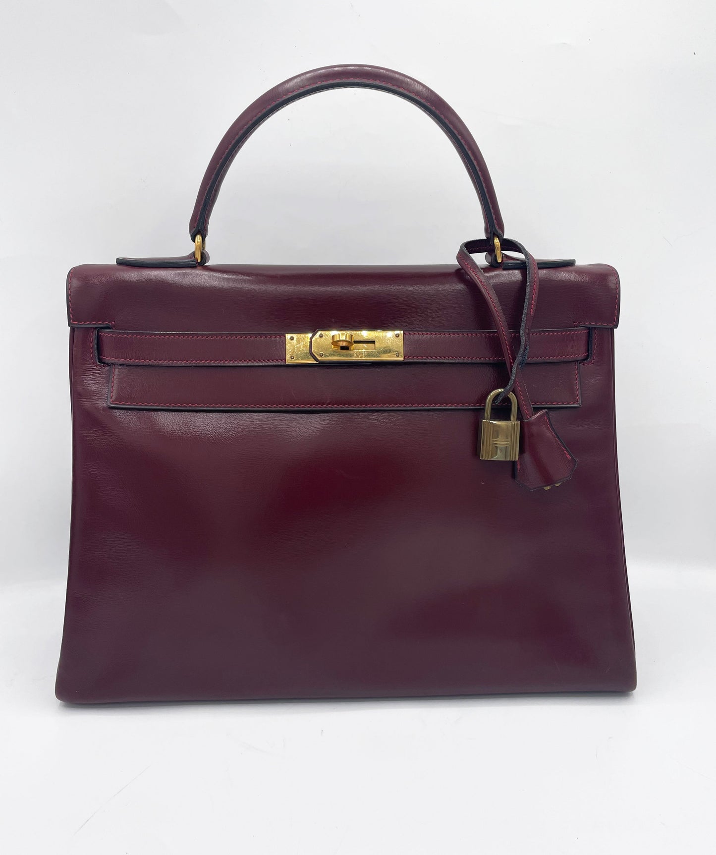 Sac Hermès Kelly 32 en cuir de box bordeaux - Soline