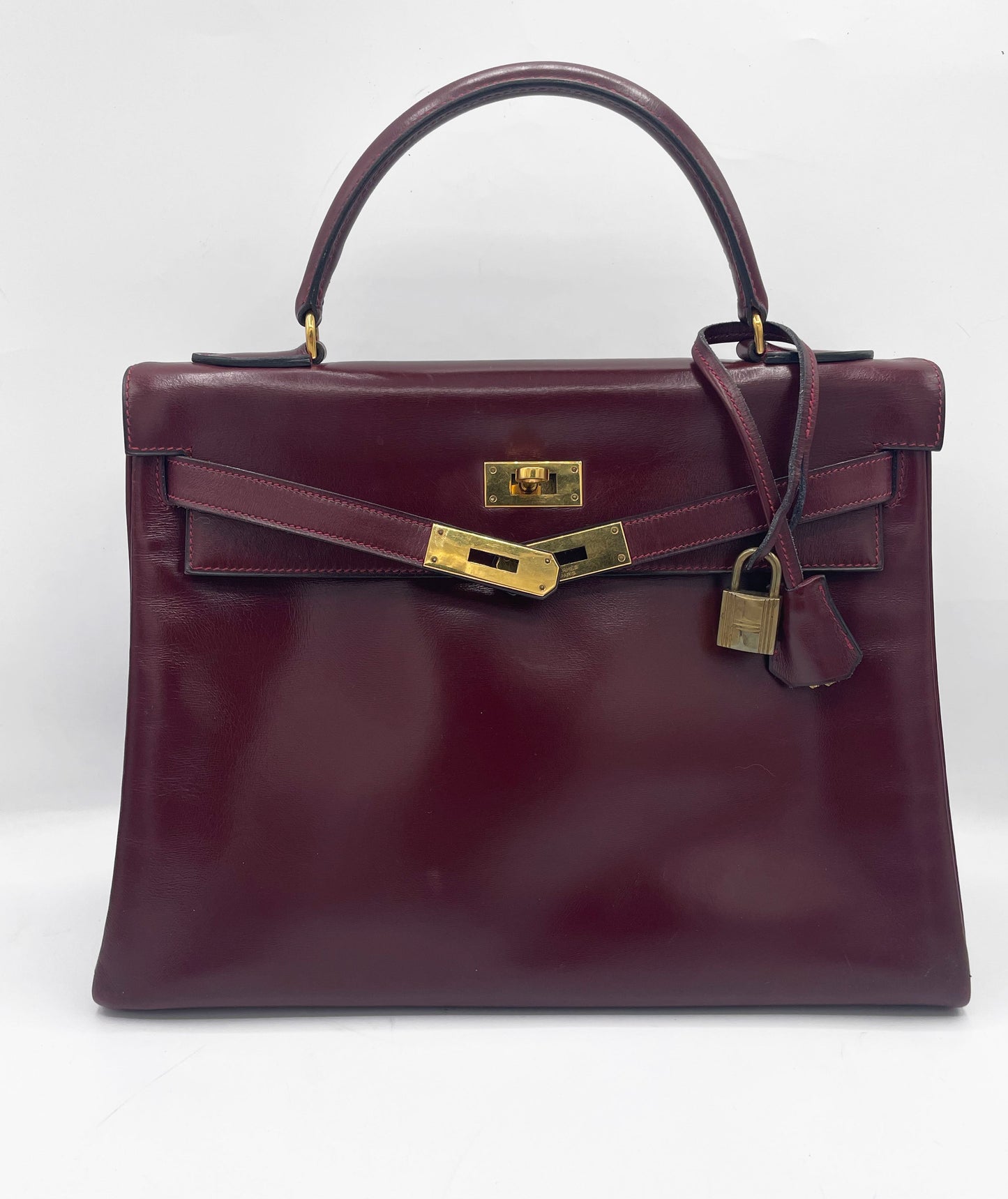 Sac Hermès Kelly 32 en cuir de box bordeaux - Soline