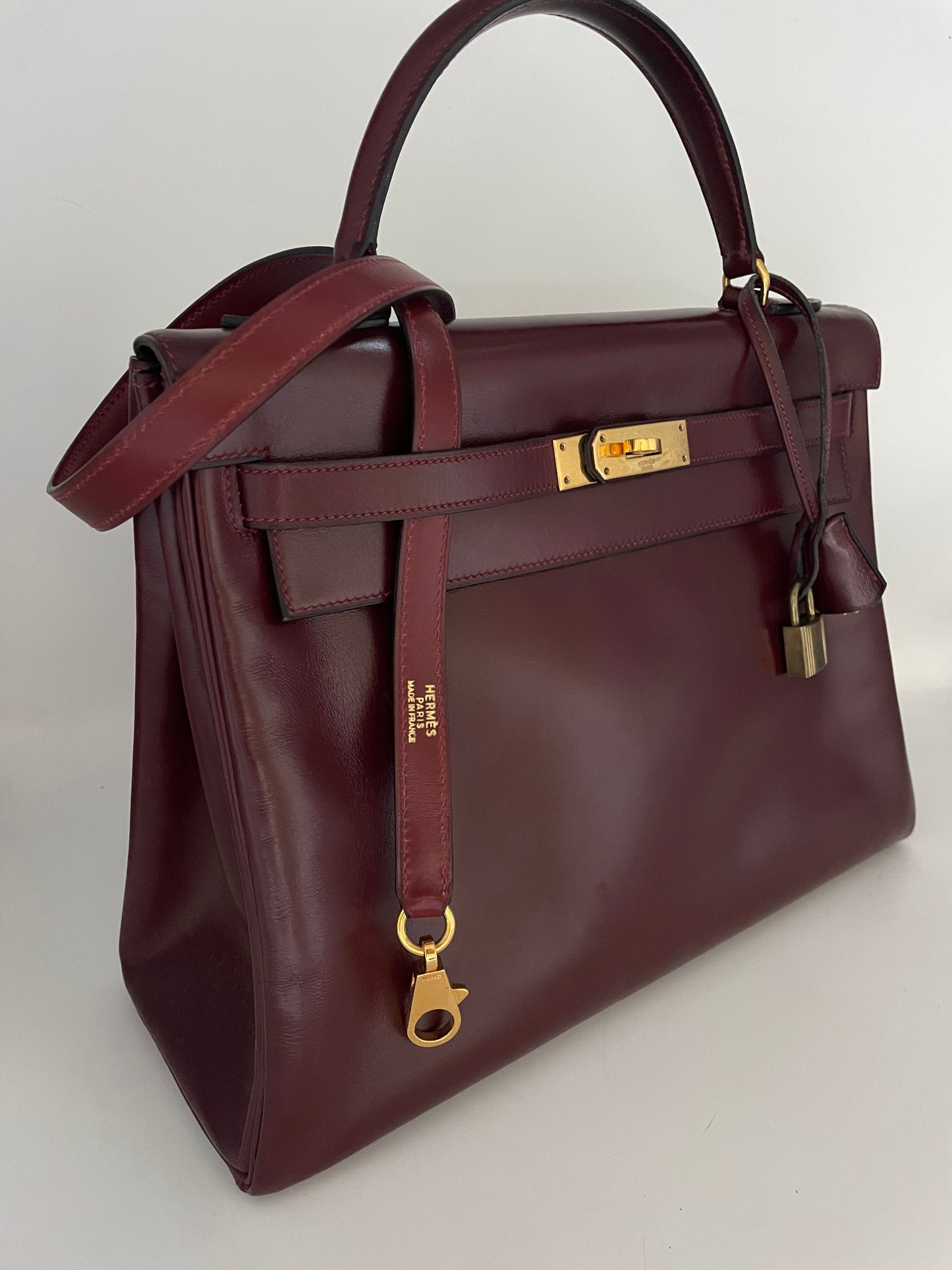 Sac Hermès Kelly 32 en cuir de box bordeaux - Soline
