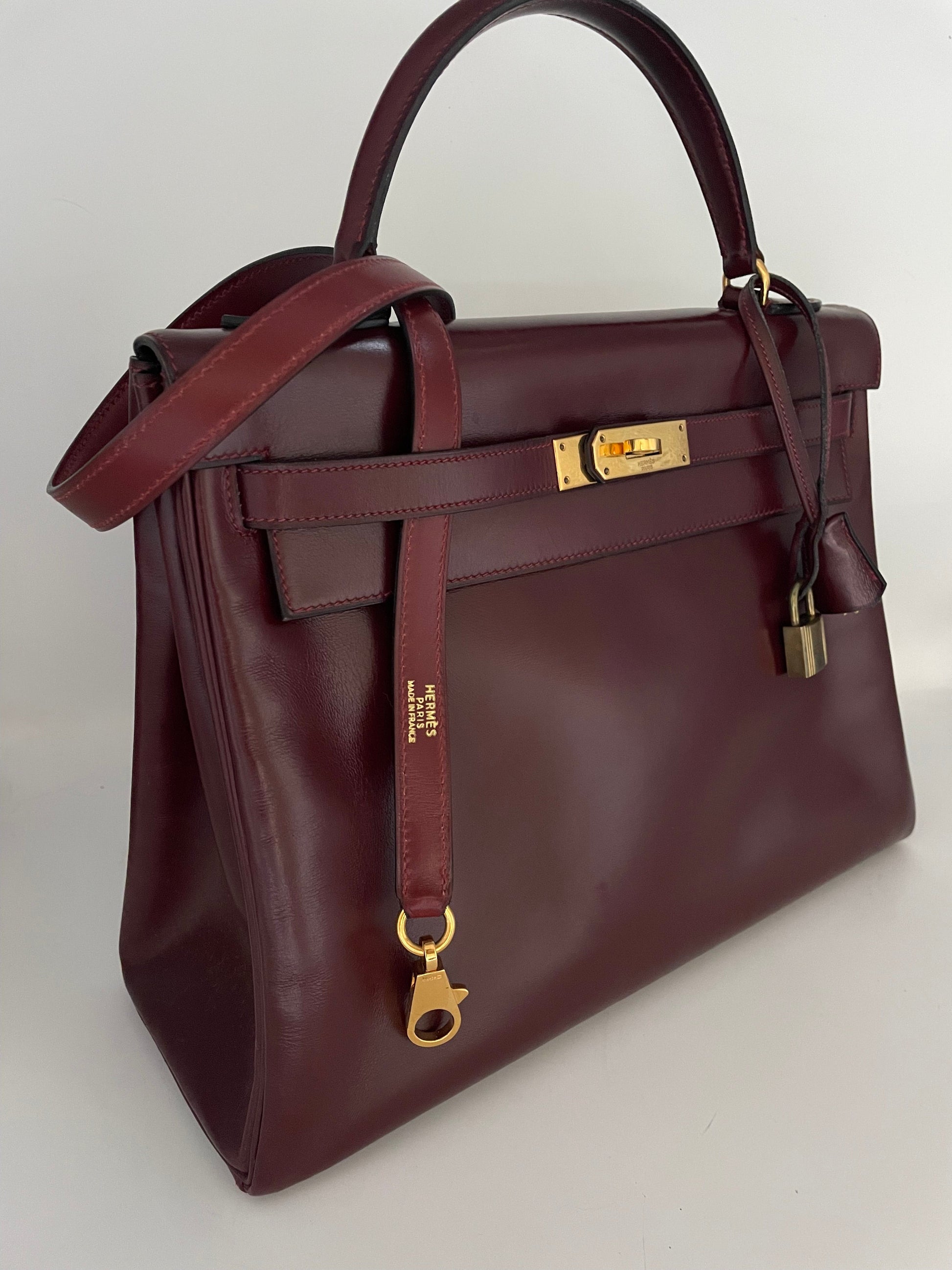 Sac Hermès Kelly 32 en cuir de box bordeaux - Soline