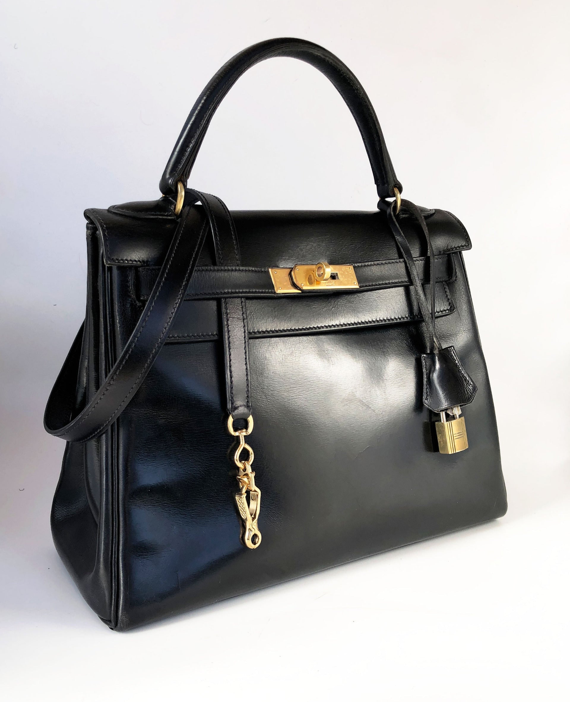 Sac Hermès kelly cuir de box noir 28 cm - Soline