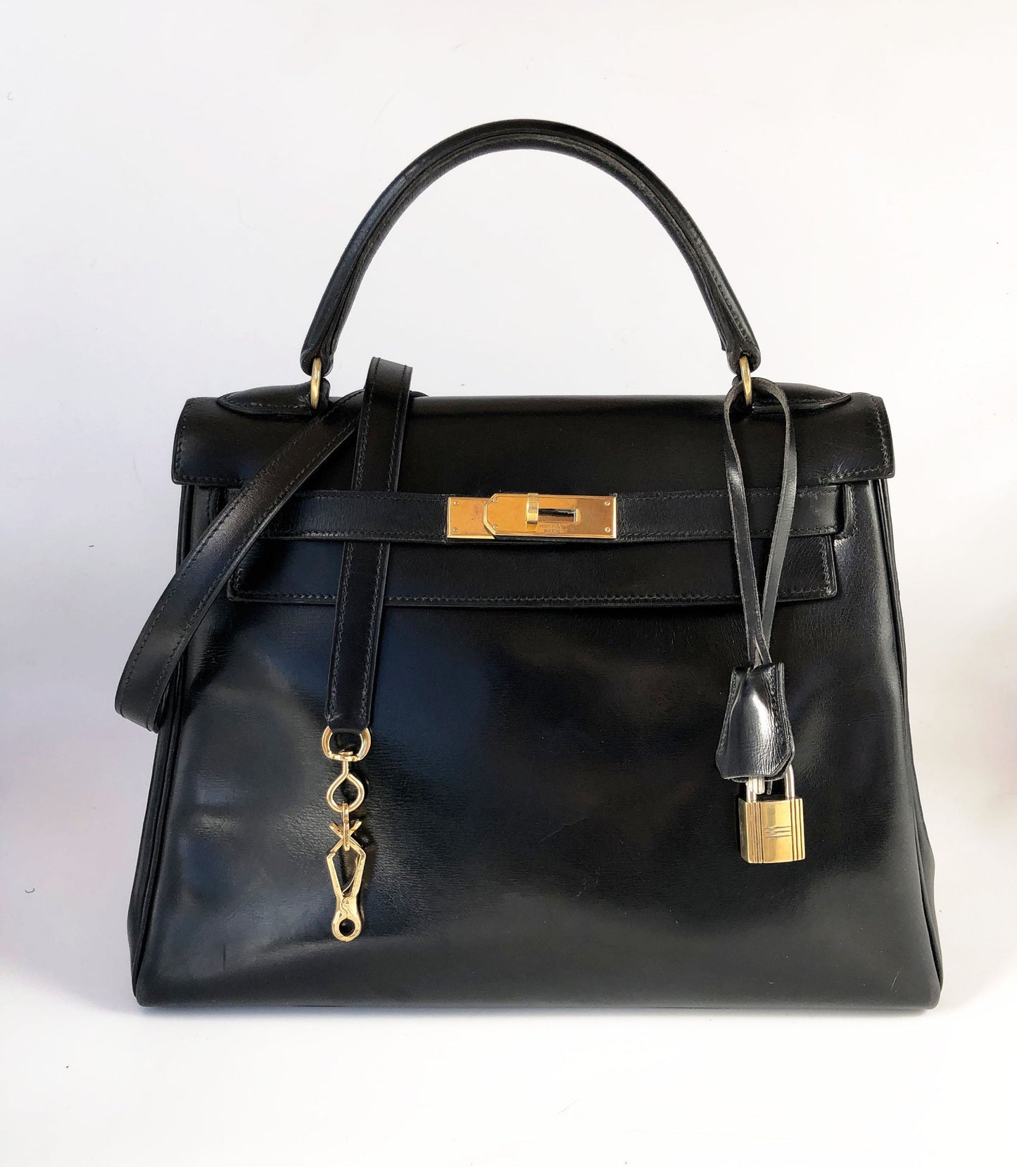 Sac Hermès kelly cuir de box noir 28 cm - Soline