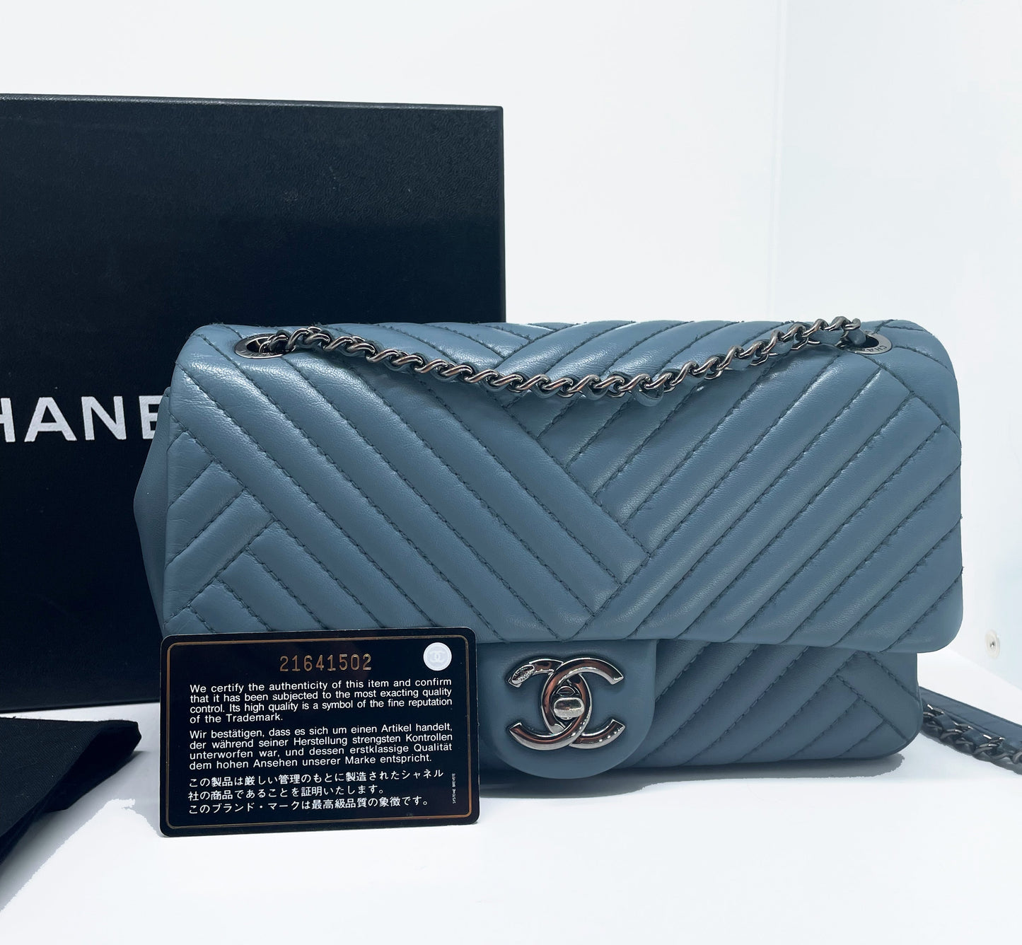 Super Sac Timeless en cuir d'agneau en motifs surpiqués Chevron asymétriques - Soline